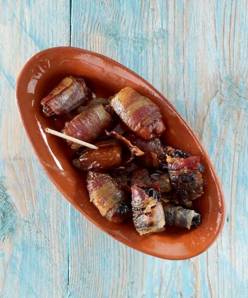 Tapas: plums and dates wrapped in bacon